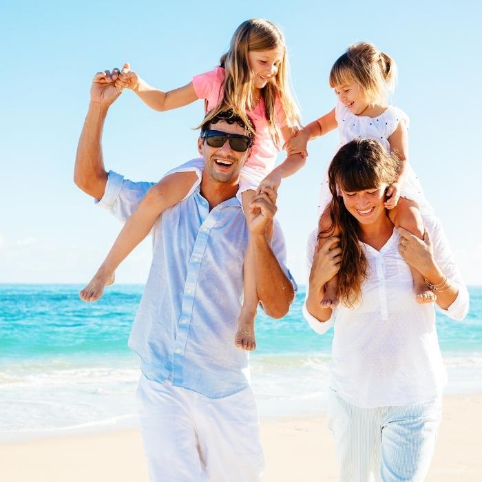 family vacation on the beach image